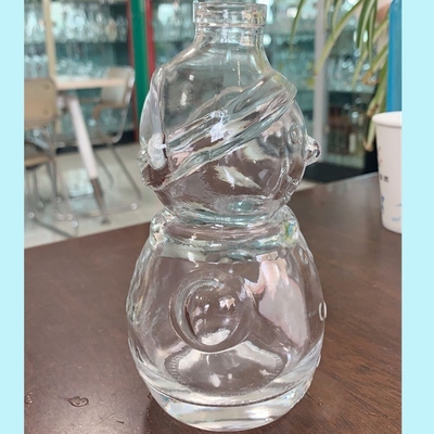 Doorzichtige Flinten Glas Sneeuwman Vorm Whisky Fles met Decal oppervlak Handleiding