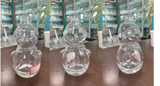 Doorzichtige Flinten Glas Sneeuwman Vorm Whisky Fles met Decal oppervlak Handleiding