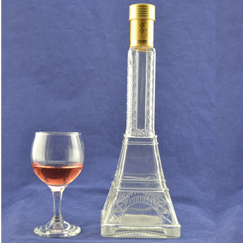 Gekleurde hoge flint glasmateriaal Eiffeltoren vorm glas drankfles met kurk